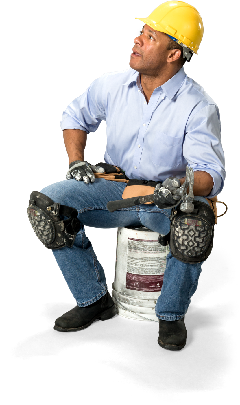 Amazed Male Construction Worker with short black hair in uniform holding hammer - Isolated